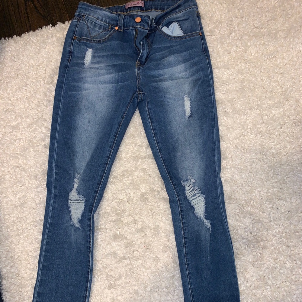 Ripped blue skinny jeans